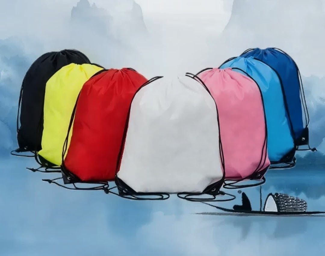 Colourful drawstring bags in black, yellow, red, white, pink and blue