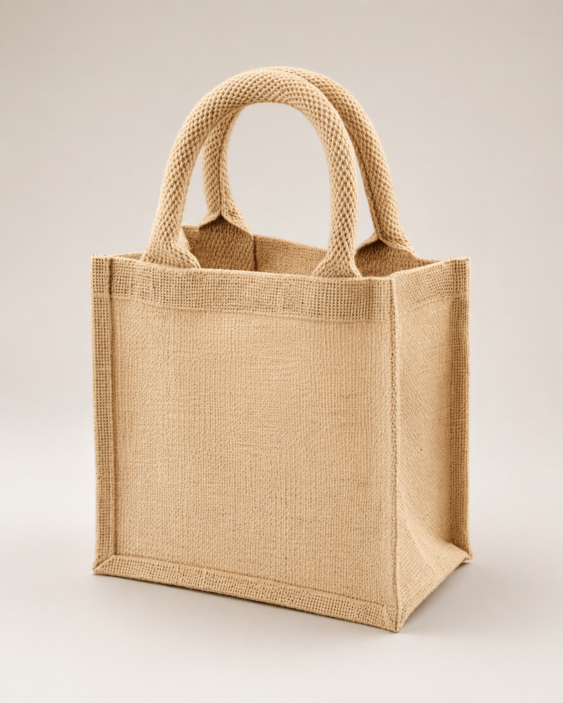 Small natural jute gift bag with woven cotton handles